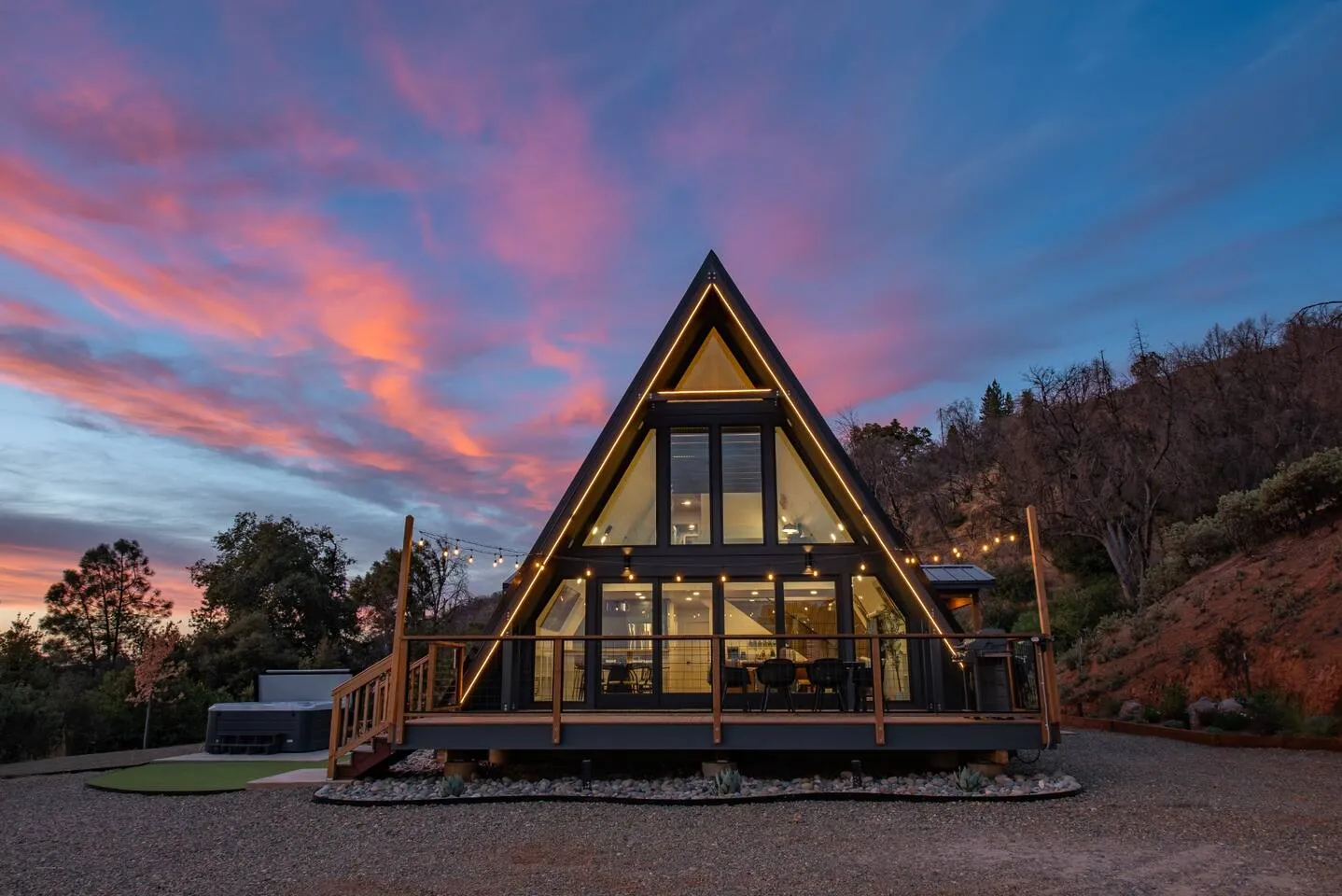 Phoenix Triangle, a modern A-frame cabin in Mariposa near Yosemite, at dusk